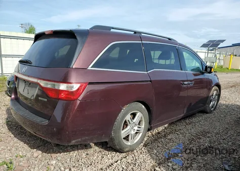 2012 Honda Odyssey Touring z USA, uszkodzony, nr VIN 5FNRL5H95CB020331